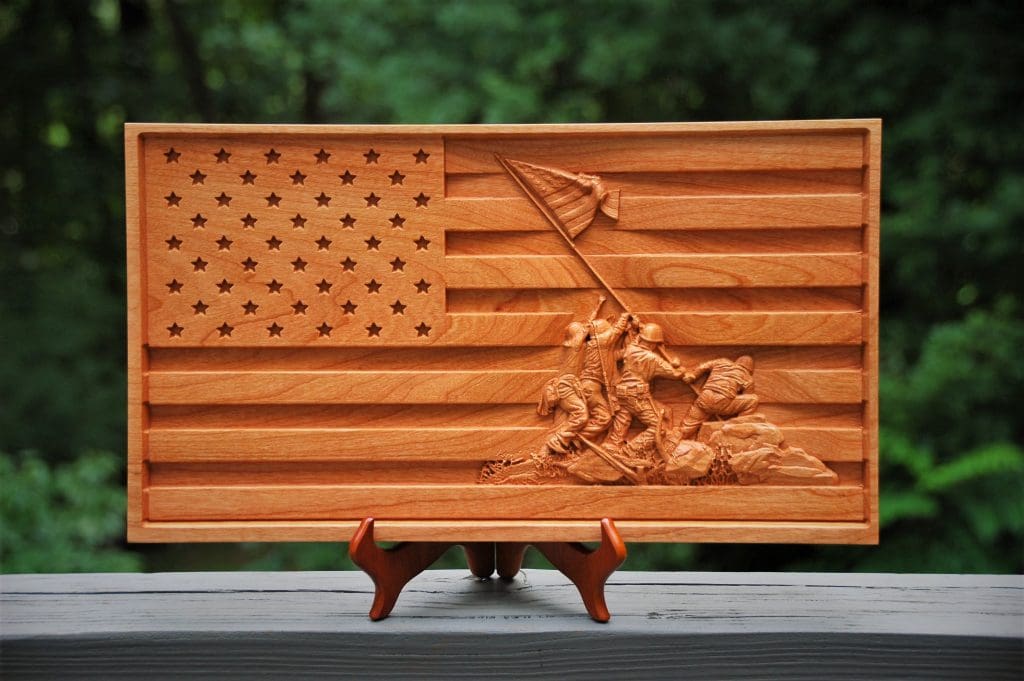 US flay with Iwo Jima flag raising carving